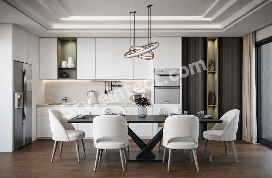 Modern Open Kitchen Interior Design with White Linear Modular Kitchen, Built-In Appliances, Integrated Dining Area and Contemporary Pendant Lighting.