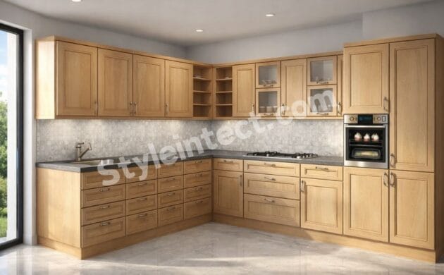 Natural Oak L-Shaped Modular Kitchen Design with Raised-Panel Wooden Cabinets, Grey Stone Countertop, Built-In Oven, Open Shelving, and Warm, Luxury Kitchen Interior.