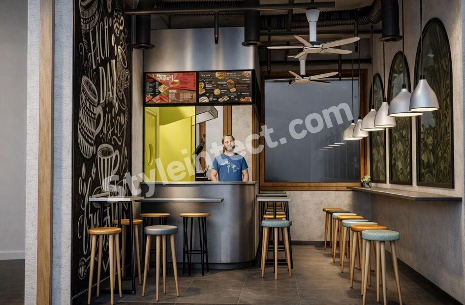 Modern industrial café interior design with stainless steel service counter, pendant lighting, wall seating, exposed ceiling, and premium commercial space planning by StyleIntect.