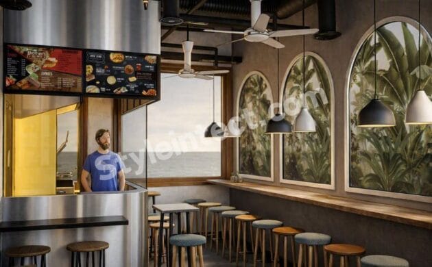 Modern industrial café interior design with stainless steel service counter, pendant lighting, wall seating, exposed ceiling, and premium commercial space planning by StyleIntect.