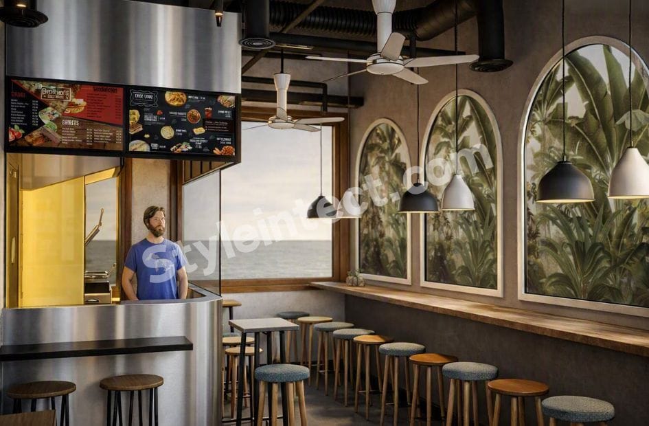 Modern industrial café interior design with stainless steel service counter, pendant lighting, wall seating, exposed ceiling, and premium commercial space planning by StyleIntect.